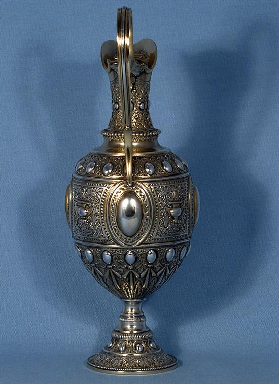 A mid Victorian parcel gilt silver ovoid shaped wine ewer/ claret jug, Height 13 ½”/340mm Weight 23.oz/653grms